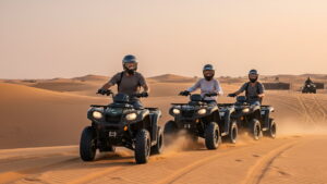 Riding a quad bike through the Dubai desert dunes.